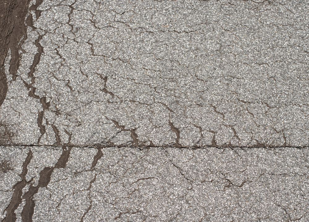 Losliggend dakleer op plat dak in Giessenburg